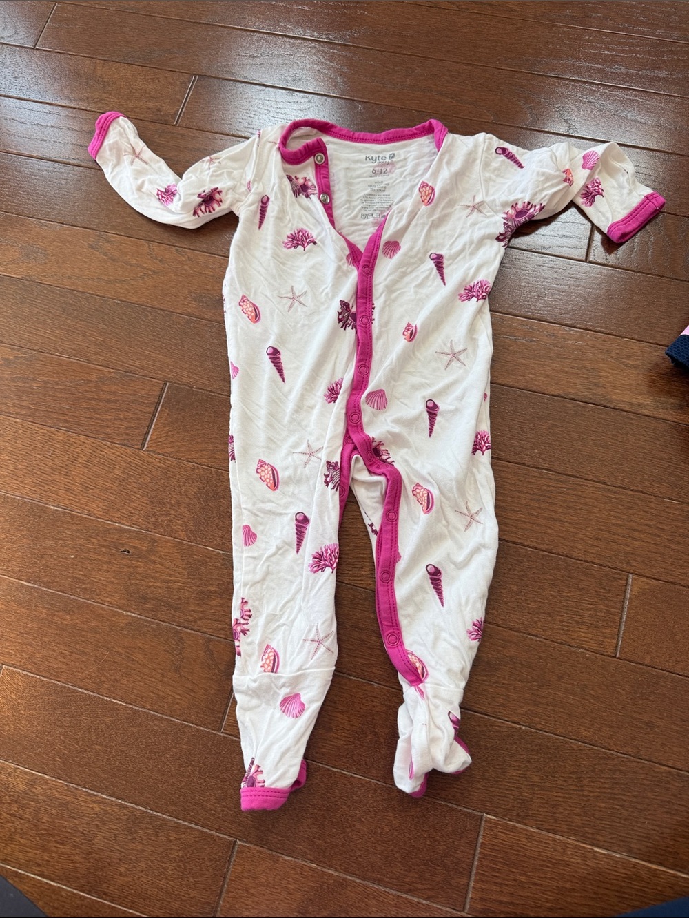 Kyte BABY White Footed One-Piece with Pink Shells